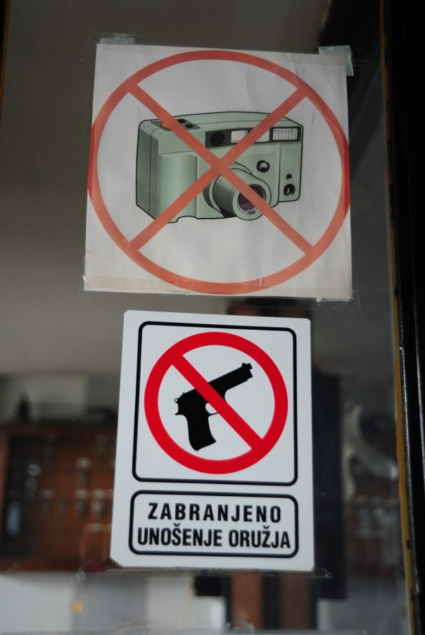 You should not bring camera and GUN with you in the museum...what is the post means?!